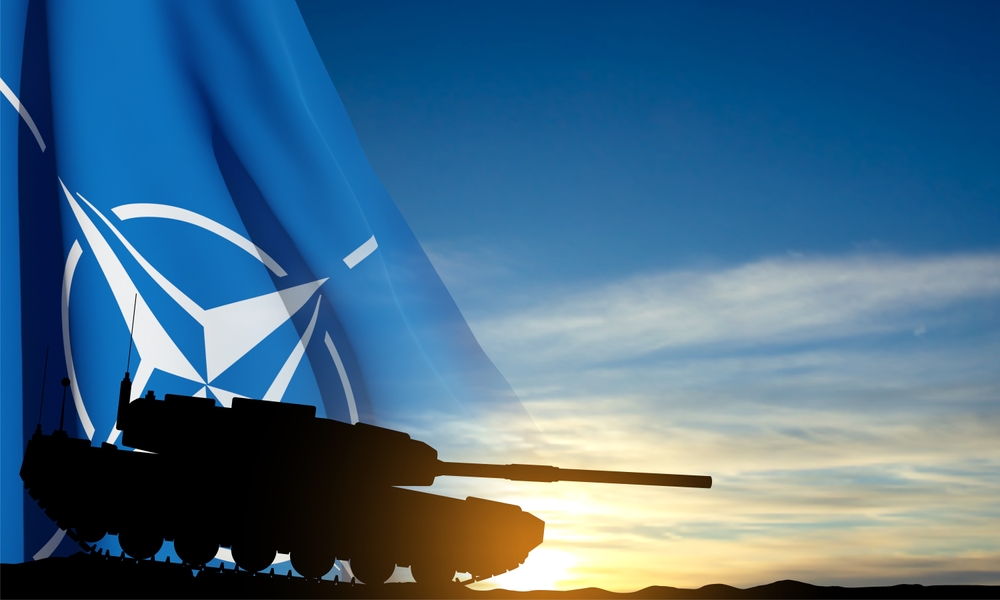 Tank and Flag of NATO on the background